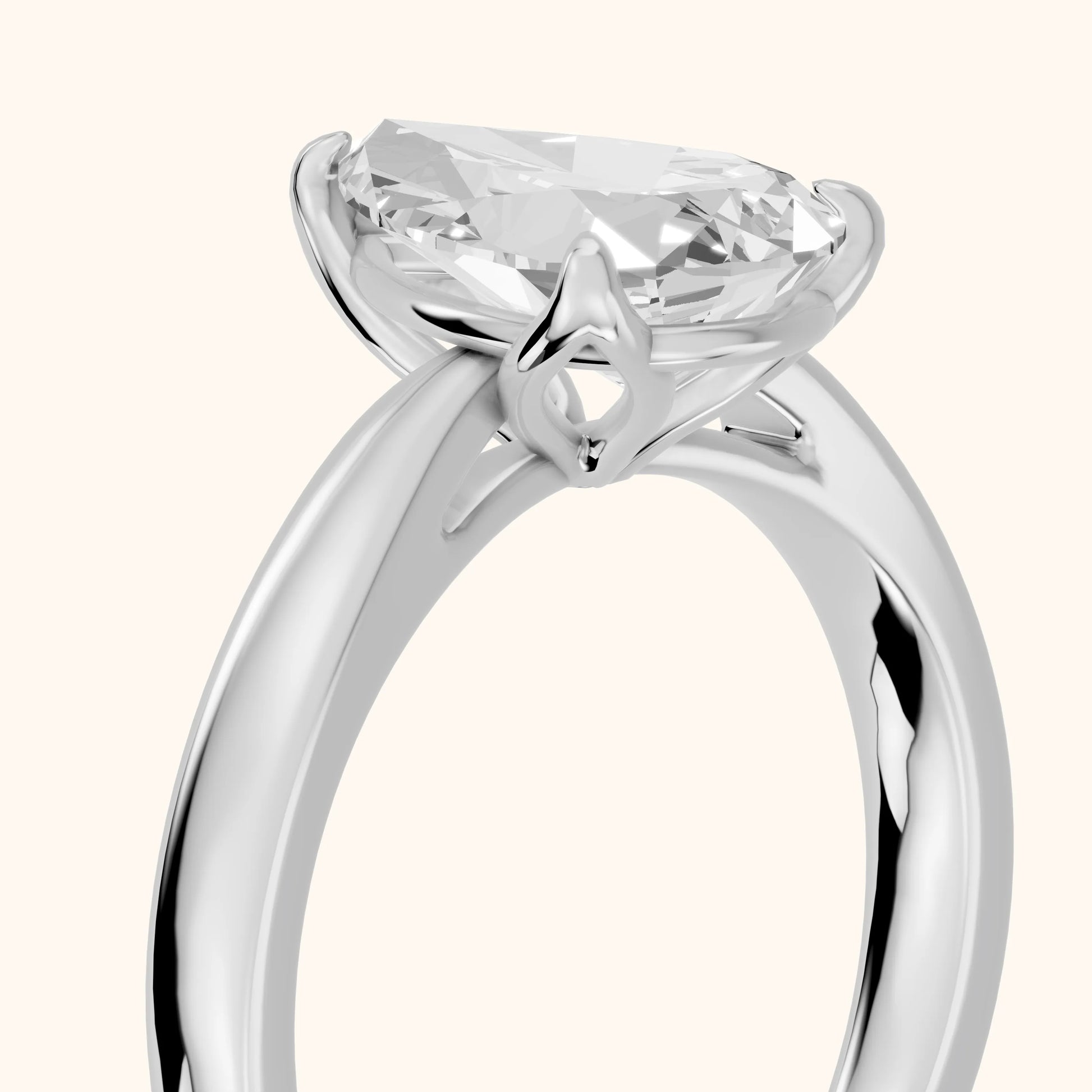 Lucia Solitaire Six-Prong Pear Diamond Engagement Ring in Platinum - slant-view.webp