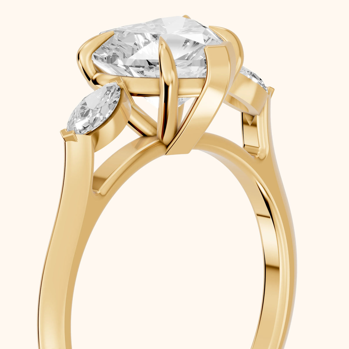 Lyra Three-Stone Heart Diamond Engagement Ring in Yellow Gold - slant-view.webp
