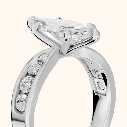 Noor Channel Set Sidestone Marquise Diamond Engagement Ring in Platinum - slant-view.webp