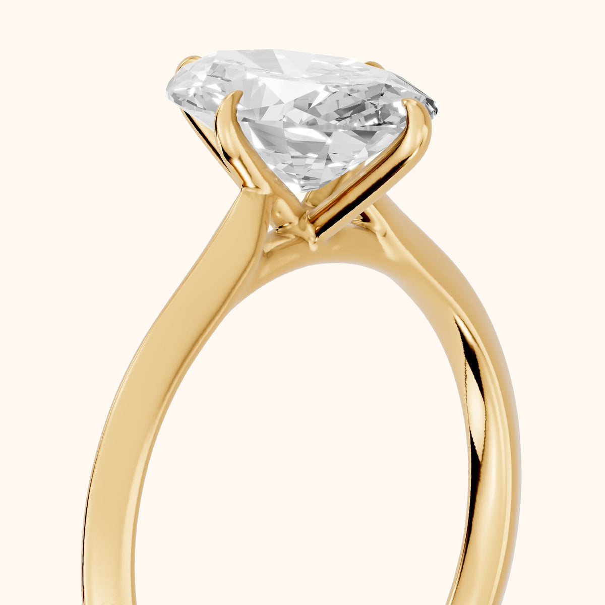 Ginette Solitaire Knife Edge Oval Diamond Engagement Ring in Yellow Gold - slant-view.webp