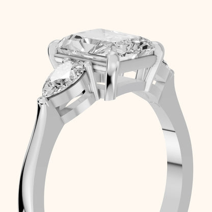 Grace Three Stone Radiant Diamond Engagement Ring in Platinum - slant-view.webp