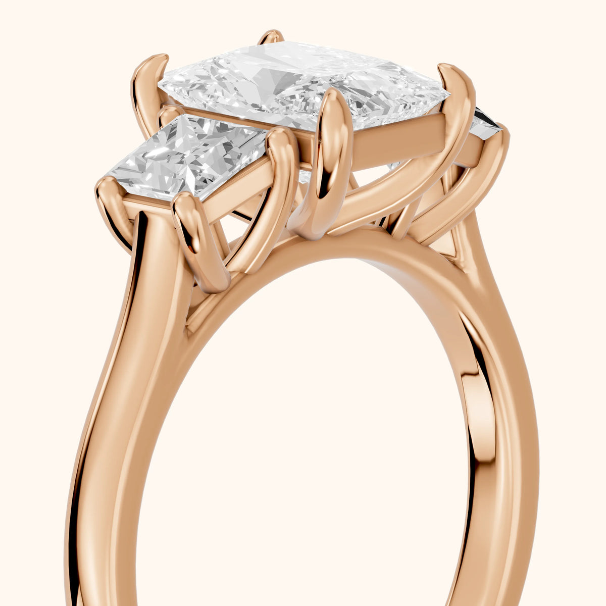 Sienna Three-Stone Radiant Diamond Engagement Ring in Rose Gold - slant-view.webp