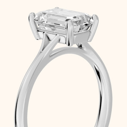 Blanche Solitaire Split Shank Emerald Diamond Engagement Ring in Platinum - slant-view.webp