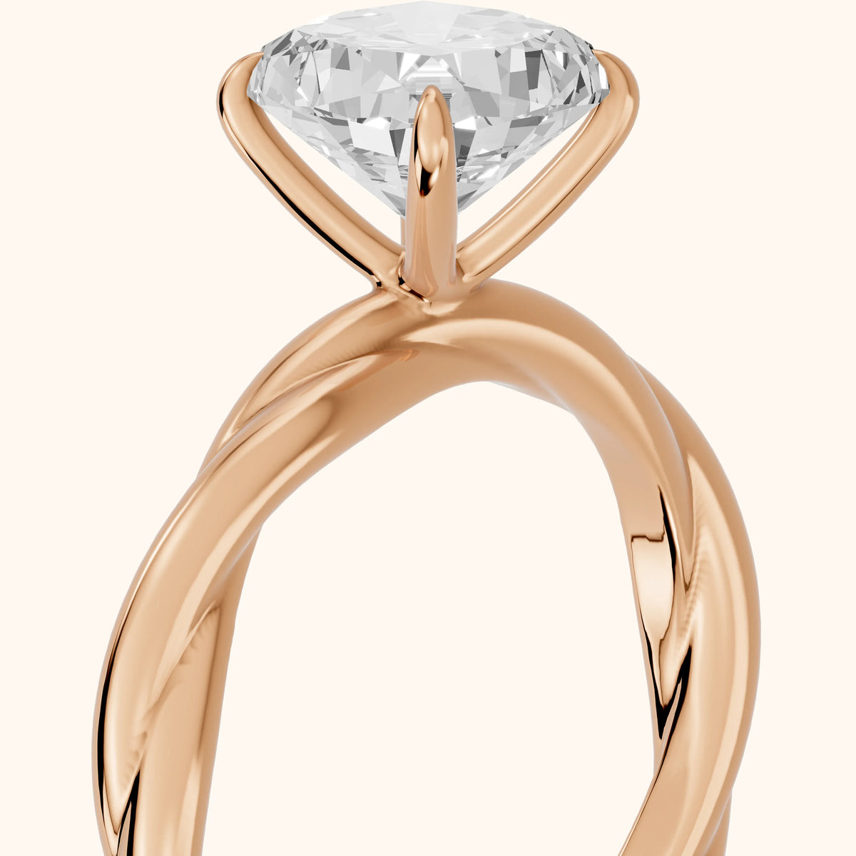 Nicola Twist Solitaire Cushion Diamond Engagement Ring in Rose Gold - slant-view.webp