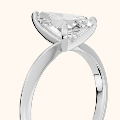 Wren Solitaire Pear Diamond Ring in Platinum - slant-view.webp