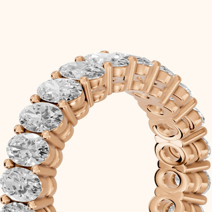 Renata Shared Prong Oval Diamond Eternity Band in Rose Gold - slant-view