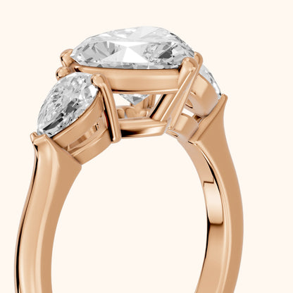 Mirabel Three-Stone Heart Diamond Engagement Ring in Rose Gold - slant-view.webp