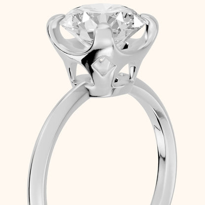 Adele Crown Solitaire Round Diamond Engagement Ring in Platinum - slant-view.webp