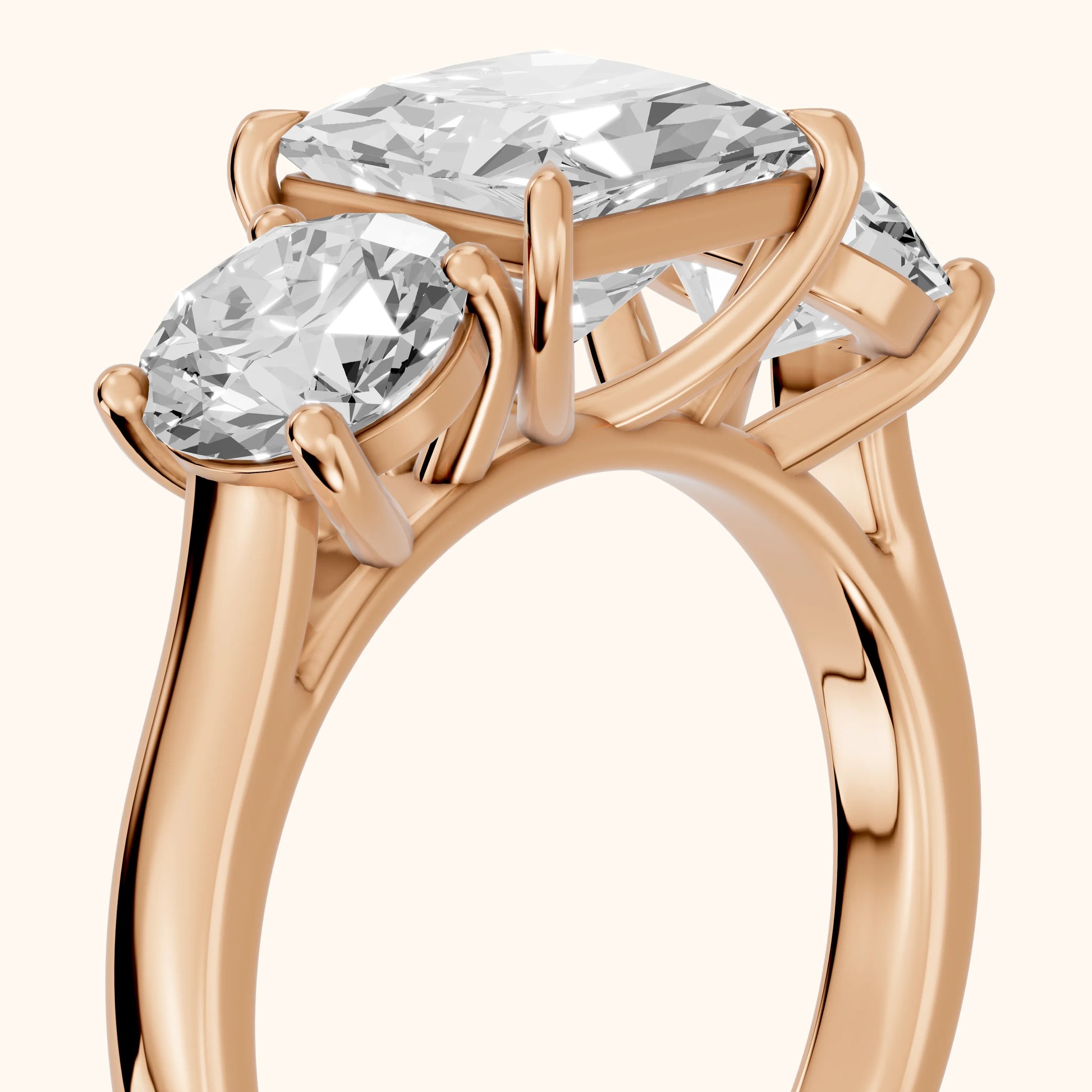 Esme Three-Stone Tapered Princess Diamond Ring in Rose Gold - slant-view.webp