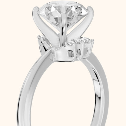 Peony East-West Hidden Halo Round Diamond Engagement Ring in Platinum - slant-view.webp