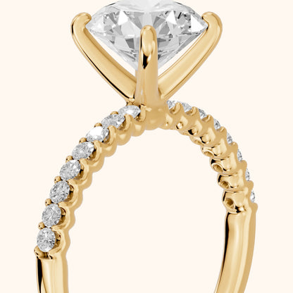 Livia Micropavé Round Diamond Engagement Ring in Yellow Gold - slant-view.webp