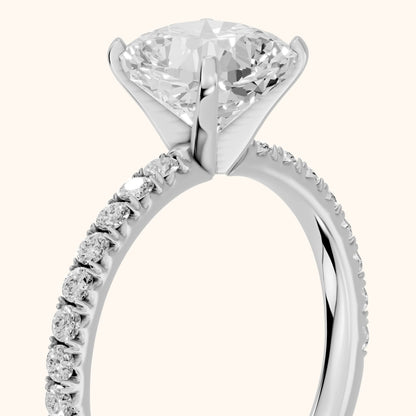 Juna French Pavé Solitaire Cushion Diamond Engagement Ring in Platinum - slant-view.webp