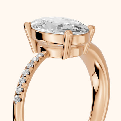 Rosie Solitaire Basket Oval Diamond Engagement Ring in Rose Gold - slant-view.webp