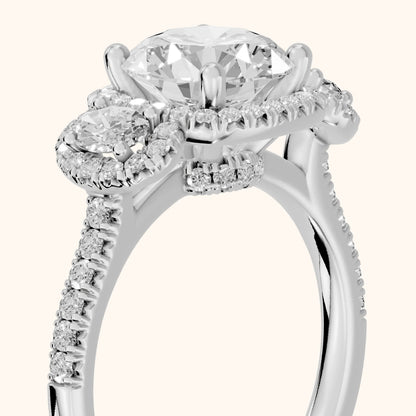 Austin Three-Stone Halo Round Diamond Engagement Ring in Platinum - slant-view.webp