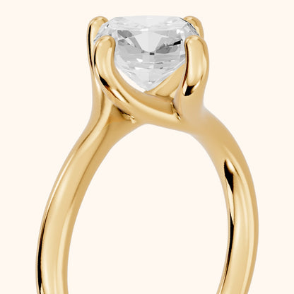 Clio Bypass Solitaire Cushion Diamond Engagement Ring in Yellow Gold - slant-view.webp