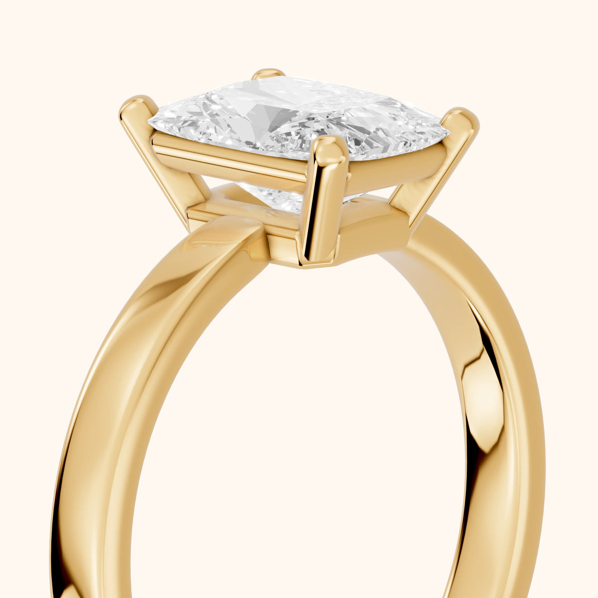 Delia Solitaire Radiant Diamond Engagement Ring in Yellow Gold - slant-view.webp
