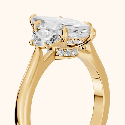 Romy Three-Stone Marquise Diamond Engagement Ring in Yellow Gold - slant-view.webp