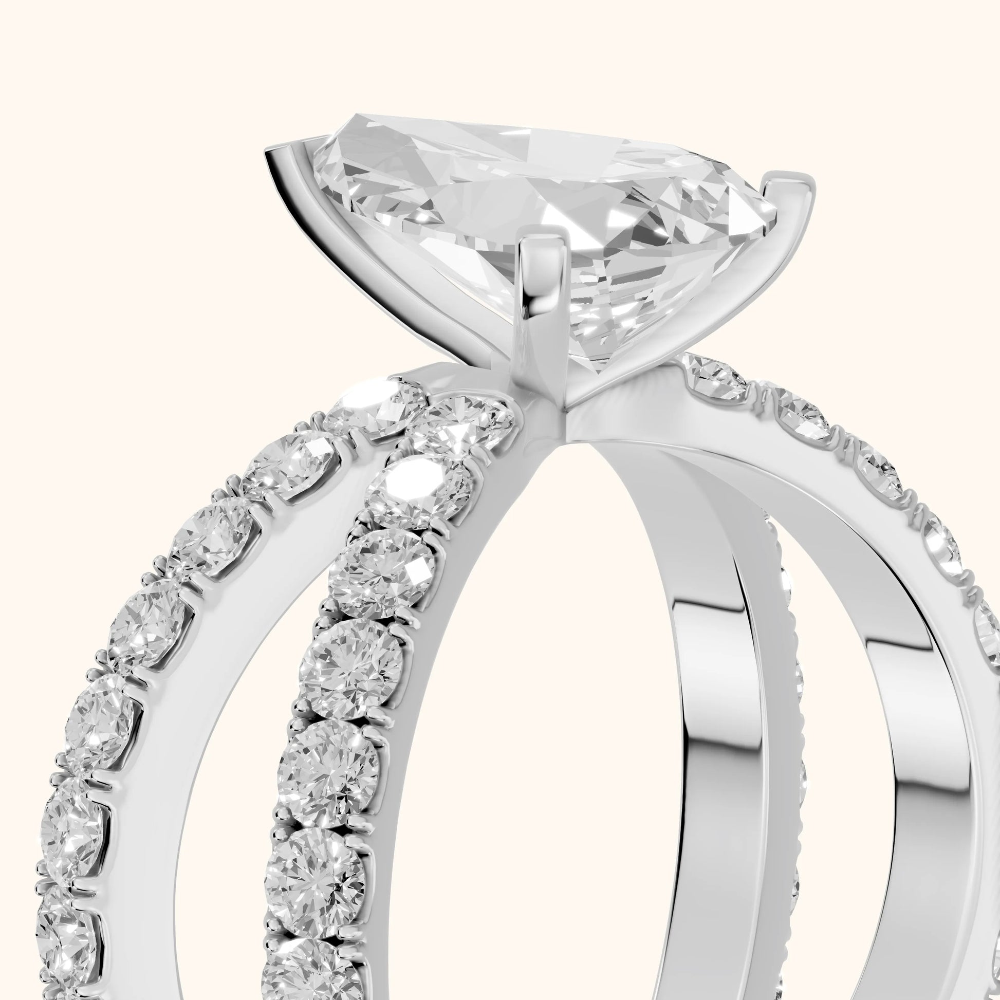 Lior Criss Cross Pavé Pear Diamond Engagement Ring in Platinum - slant-view.webp