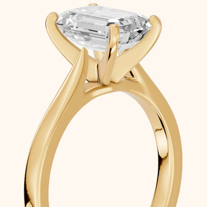 Cicely Solitaire Cathedral Emerald Diamond Engagement Ring in Yellow Gold - slant-view.webp