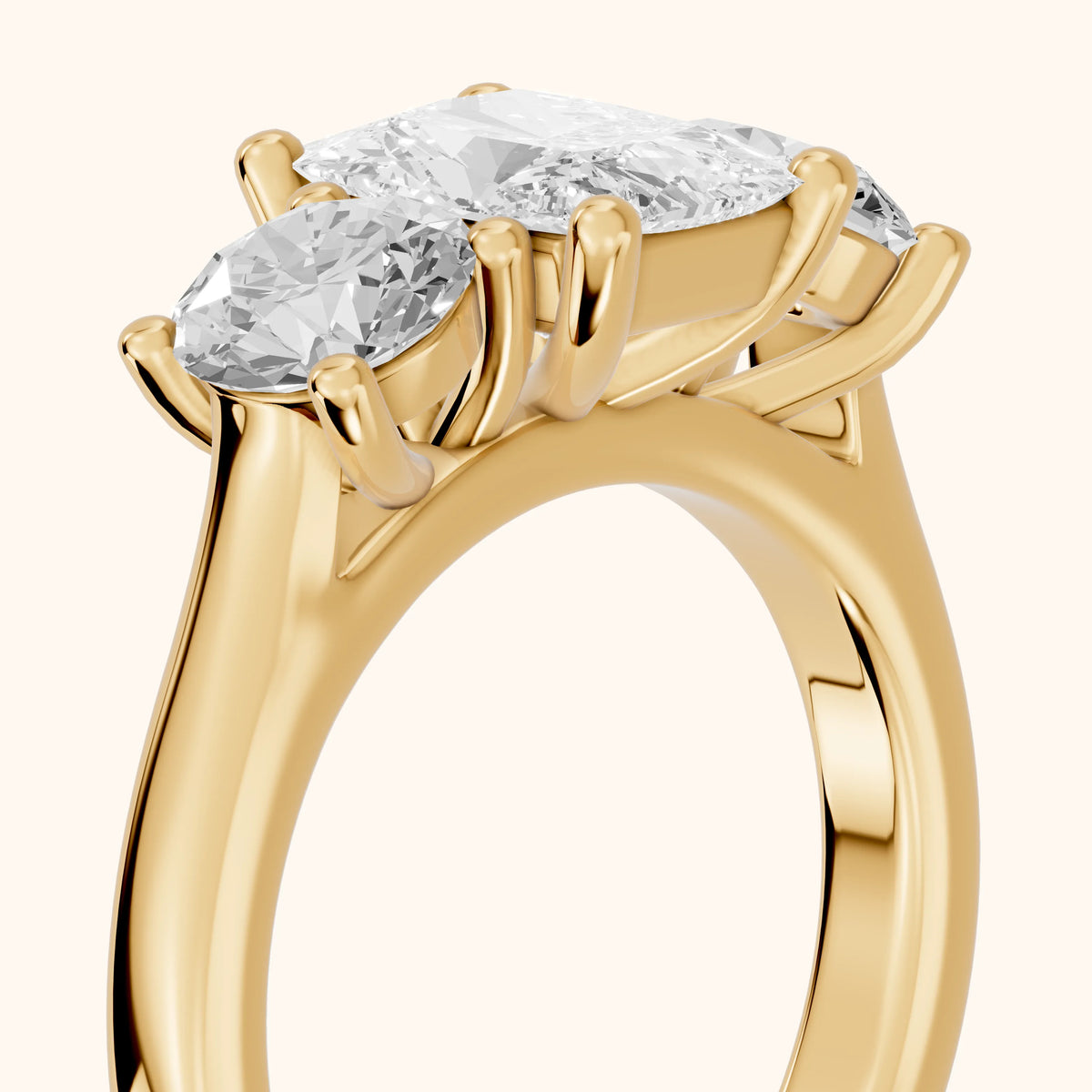 Callie Three-Stone Trellis Radiant Diamond Engagement Ring in Yellow Gold - slant-view.webp