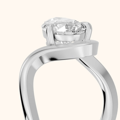 Empire Solitaire Bypass Pear Diamond Engagement Ring in Platinum - slant-view.webp