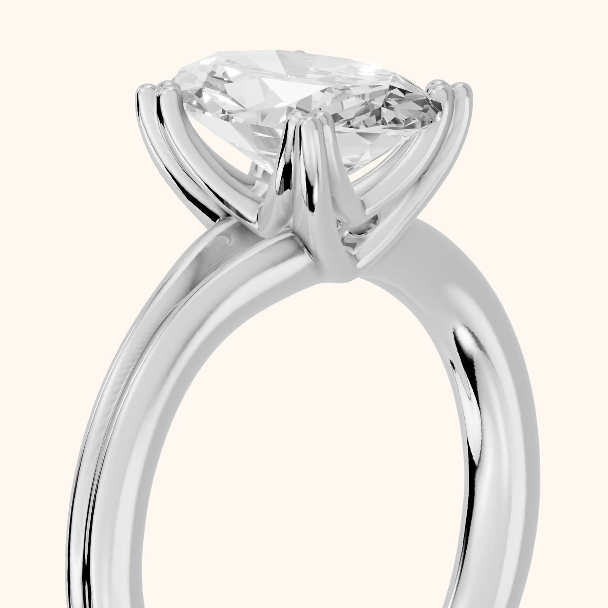 Neve Solitaire Split Shank Oval Diamond Engagement Ring in Platinum - slant-view.webp
