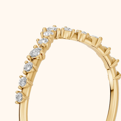 Naina Curved Round Diamond Wedding Band in Yellow Gold - slant-view