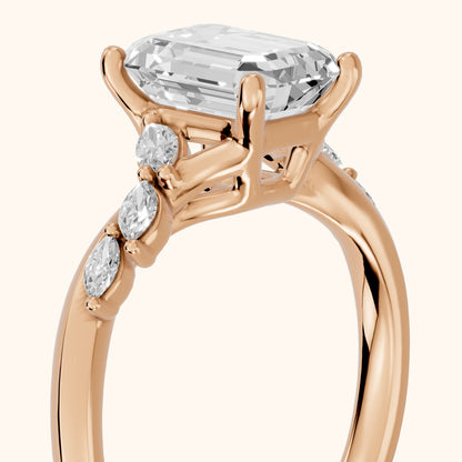 Cathy Leaf Twist Emerald Diamond Engagement Ring in Rose Gold - slant-view.webp