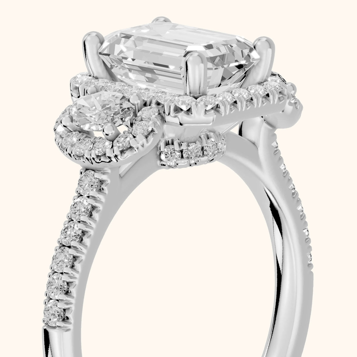 Austin Three-Stone Halo Emerald Diamond Engagement Ring in White Gold - slant-view.webp