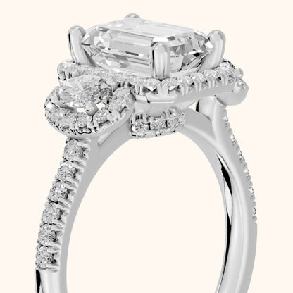 Austin Three-Stone Halo Emerald Diamond Engagement Ring in White Gold - slant-view.webp