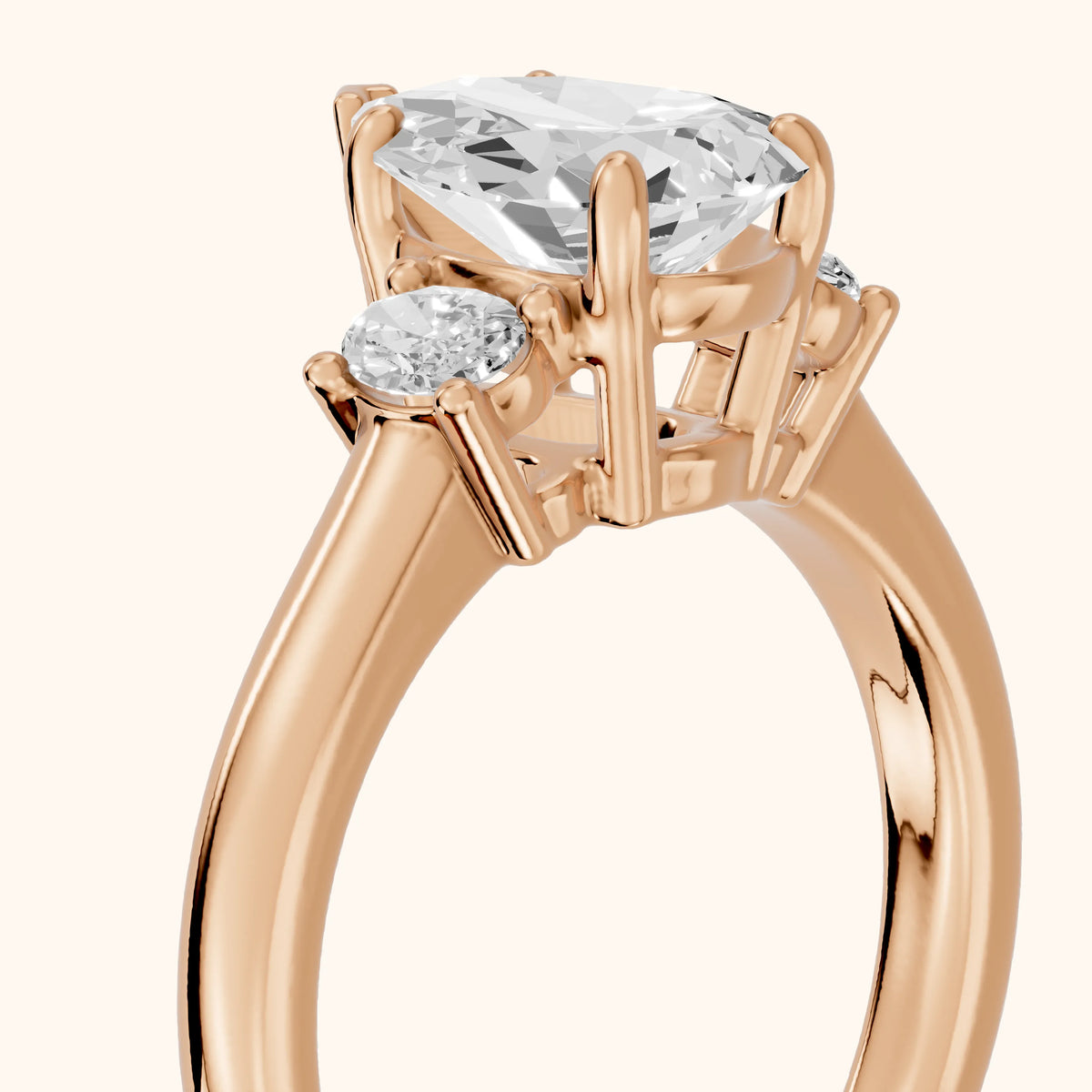 Alya Three-Stone Cathedral Pear Diamond Engagement Ring in Rose Gold - slant-view.webp