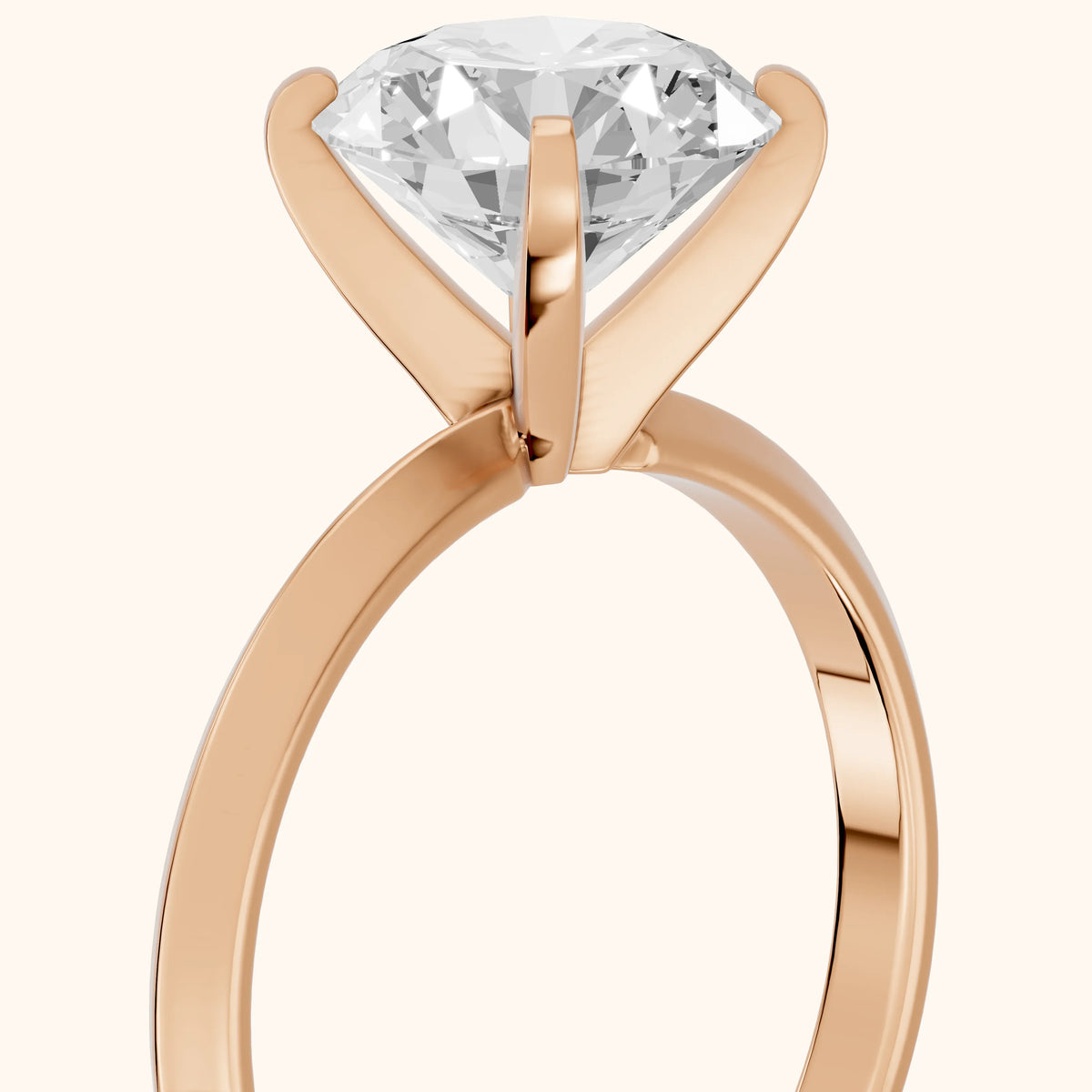 Verity Solitaire Knife Edge Round Diamond Engagement Ring in Rose Gold - slant-view.webp