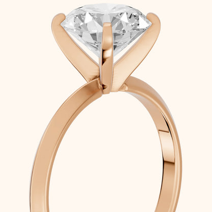 Verity Solitaire Knife Edge Round Diamond Engagement Ring in Rose Gold - slant-view.webp