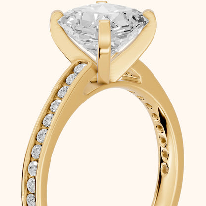 Tessa Solitaire Channel Set Radiant Diamond Engagement Ring in Yellow Gold - slant-view.webp