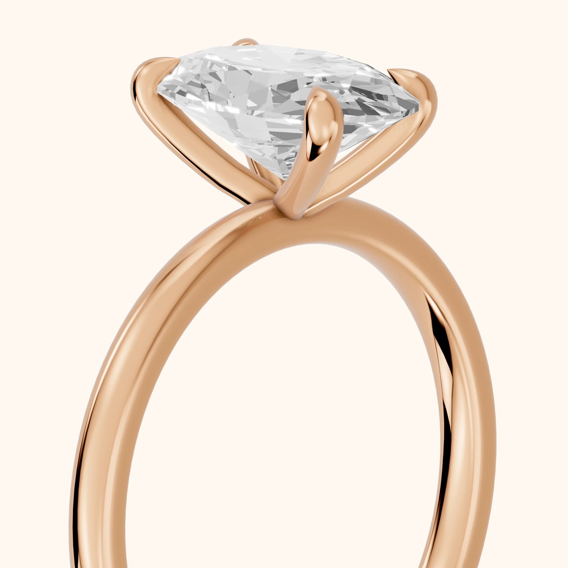 Nella Petite Solitaire Oval Diamond Engagement Ring in Rose Gold - slant-view.webp