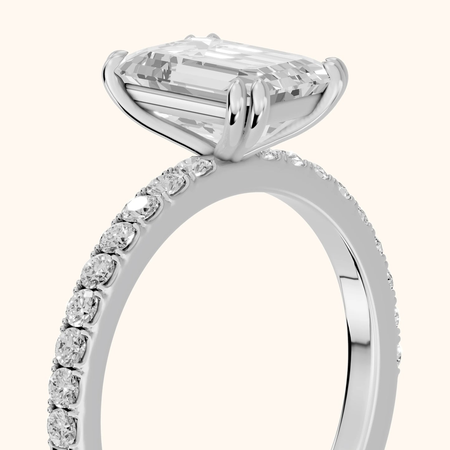 Novara Solitaire Pavé Emerald Diamond Ring in Platinum - slant-view.webp
