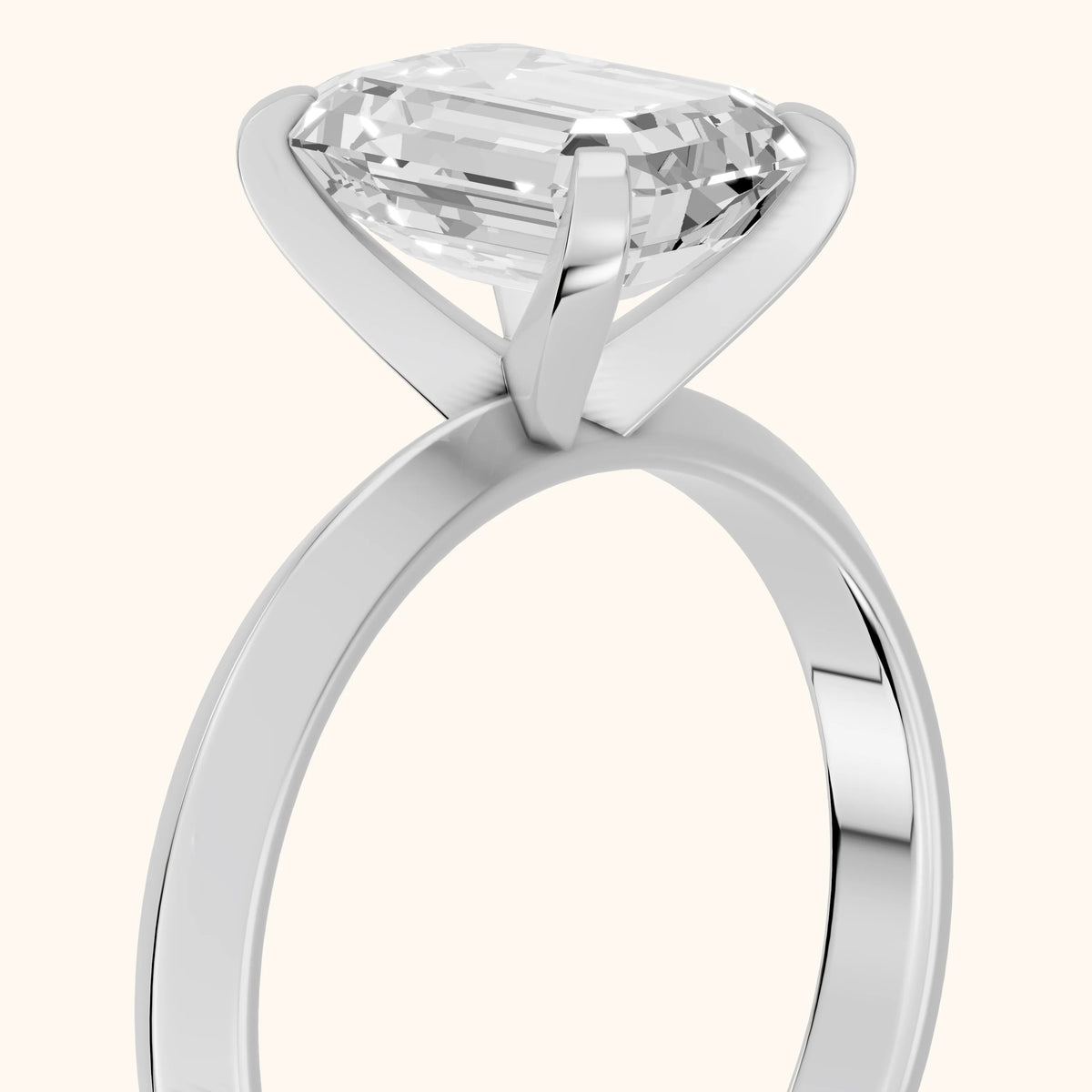 June Solitaire Knife Edge Emerald Diamond Engagement Ring in Platinum - slant-view.webp