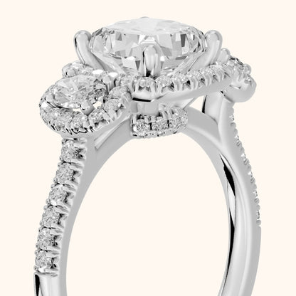 Austin Three-Stone Halo Cushion Diamond Engagement Ring in Platinum - slant-view.webp