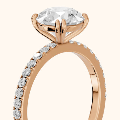 Novara Solitaire Pavé Round Diamond Ring in Rose Gold - slant-view.webp
