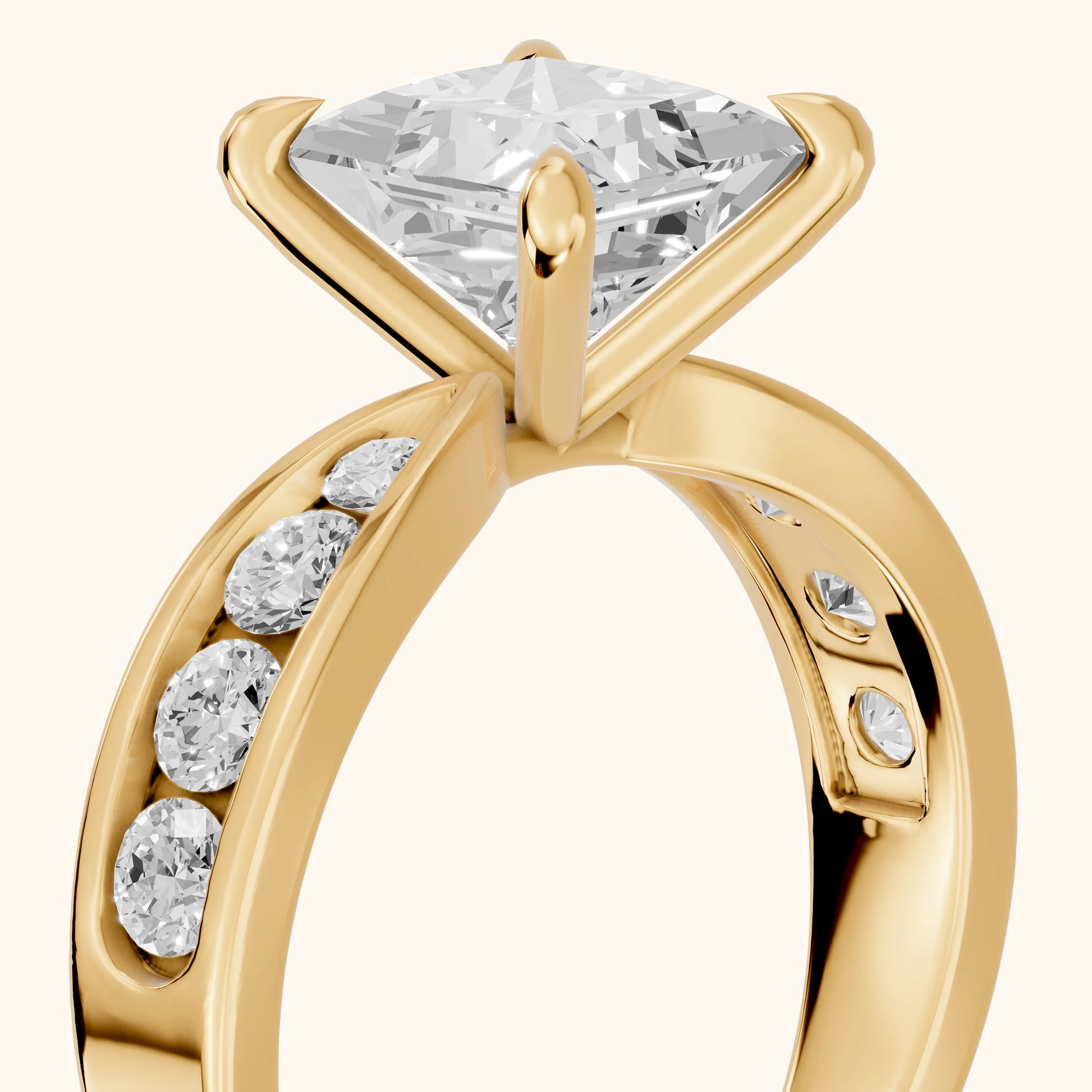 Noor Channel Set Sidestone Princess Diamond Engagement Ring in Yellow Gold - slant-view.webp