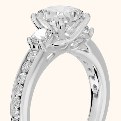 Bluebell Three-Stone Channel Set Cushion Diamond Engagement Ring in Silver - slant-view.webp