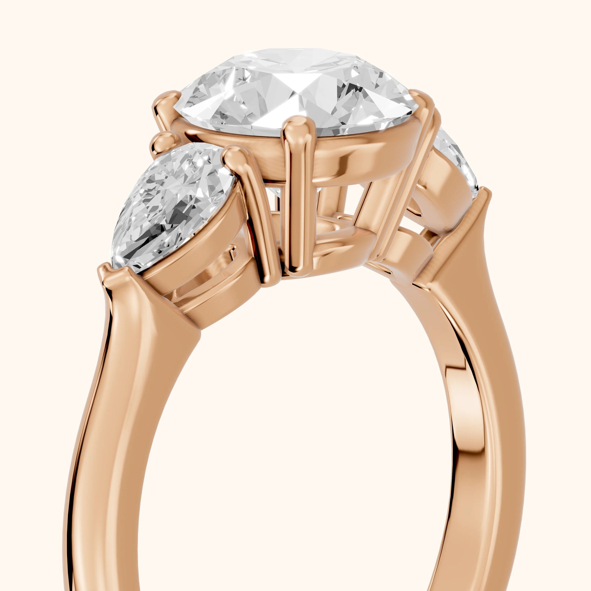 Mirabel Three-Stone Round Diamond Engagement Ring in Rose Gold - slant-view.webp