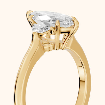 Hilary Half-Moon Three-Stone Marquise Diamond Engagement Ring in Yellow Gold - slant-view.webp