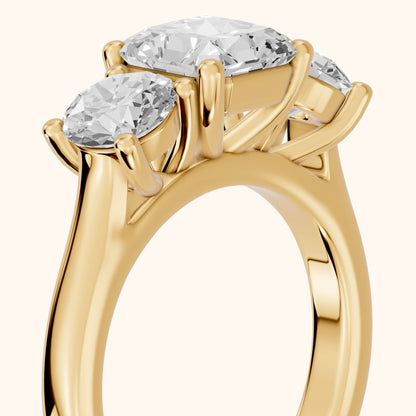 Callie Three-Stone Trellis Radiant Diamond Engagement Ring in Yellow Gold - slant-view.webp