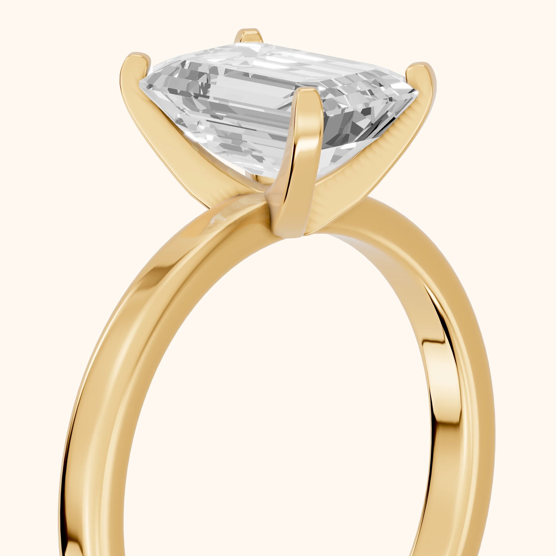 Liana Solitaire Claw Prong Emerald Diamond Engagement Ring in Yellow Gold - slant-view.webp