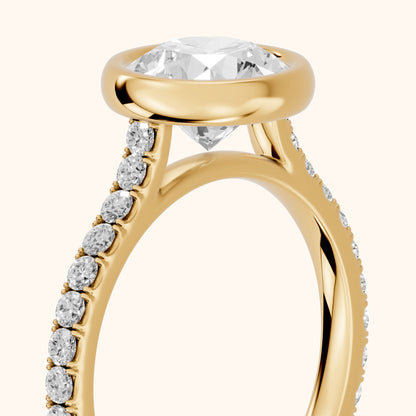 Cora Bezel Pavé Round Diamond Ring in Yellow Gold - slant-view.webp