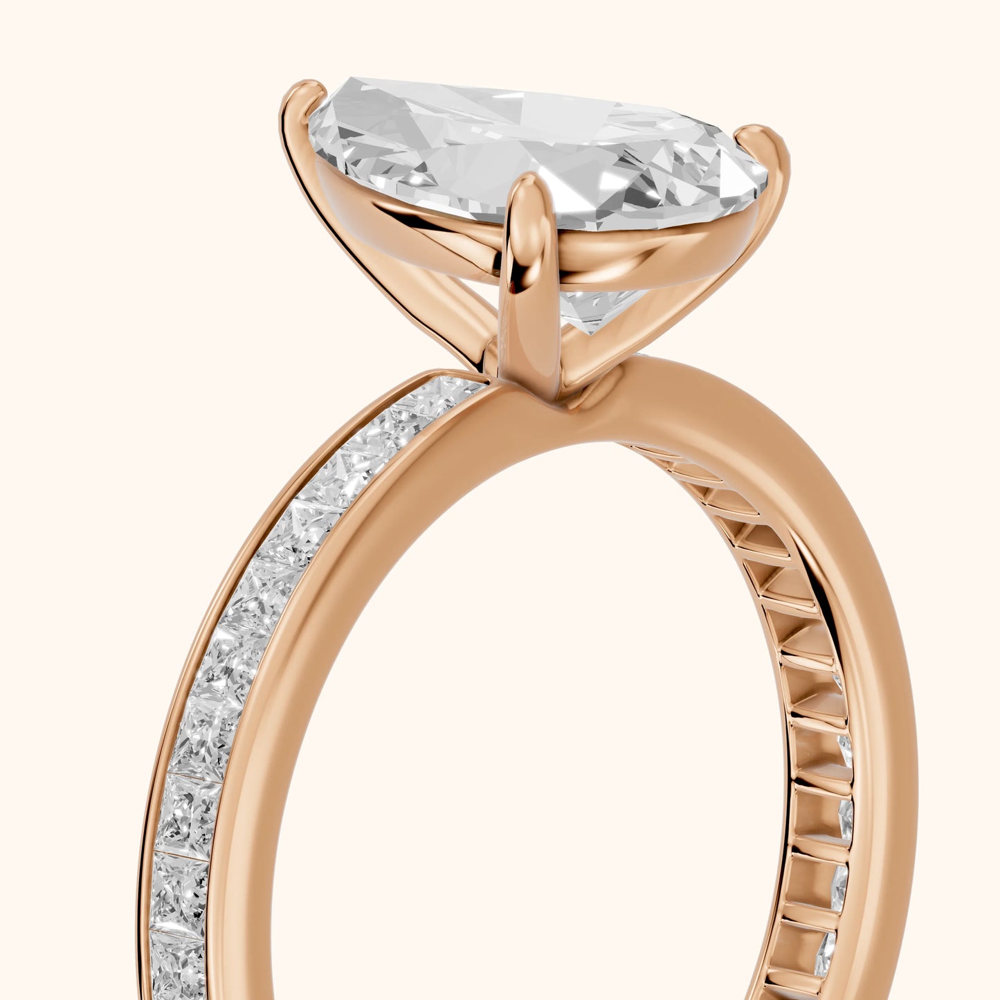 Brielle Channel Set Solitaire Pear Diamond Ring in Rose Gold - slant-view.webp