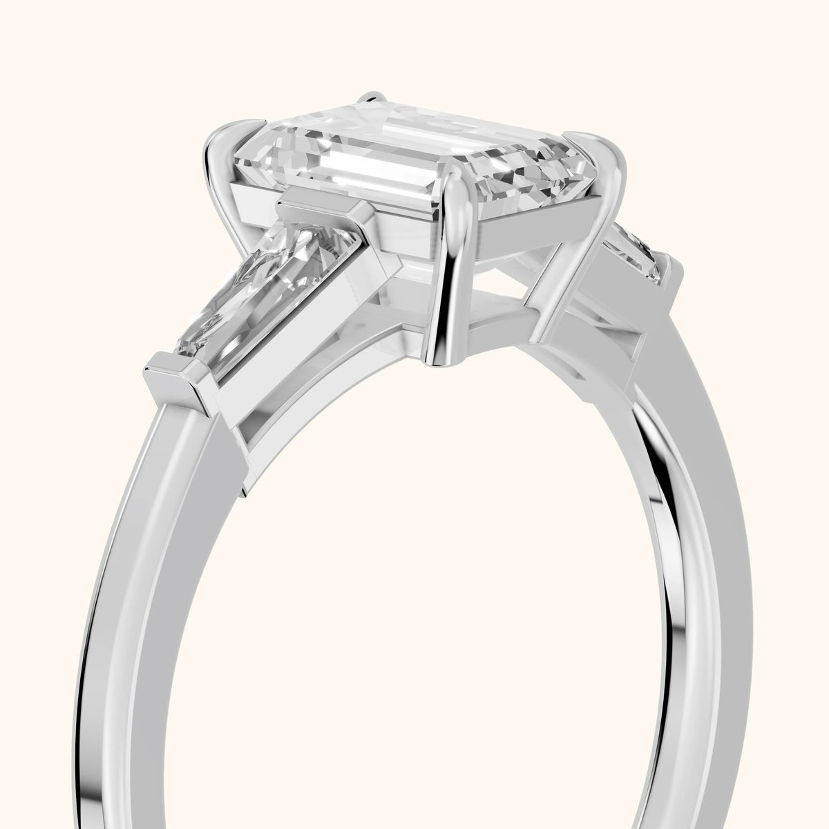 Winnie Three-Stone Emerald Diamond Engagement Ring in Platinum - slant-view.webp
