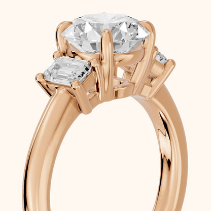 Babette Deco Three-Stone Round Diamond Engagement Ring in Rose Gold - slant-view.webp