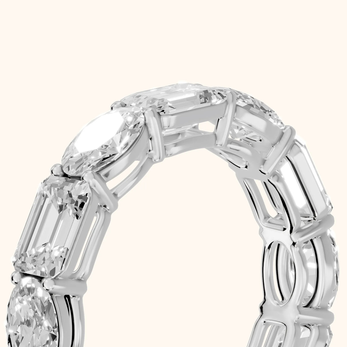 Hema Shared Prong Emerald & Oval Diamond Eternity Band in Silver - slant-view